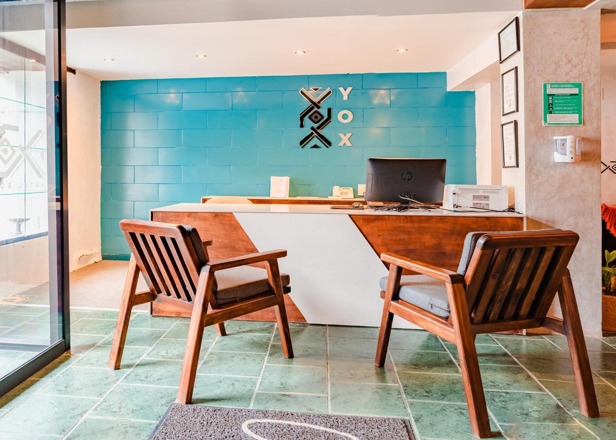 Yox Hotel Boutique San Cristobal de las Casas Exterior photo The reception area of the hotel