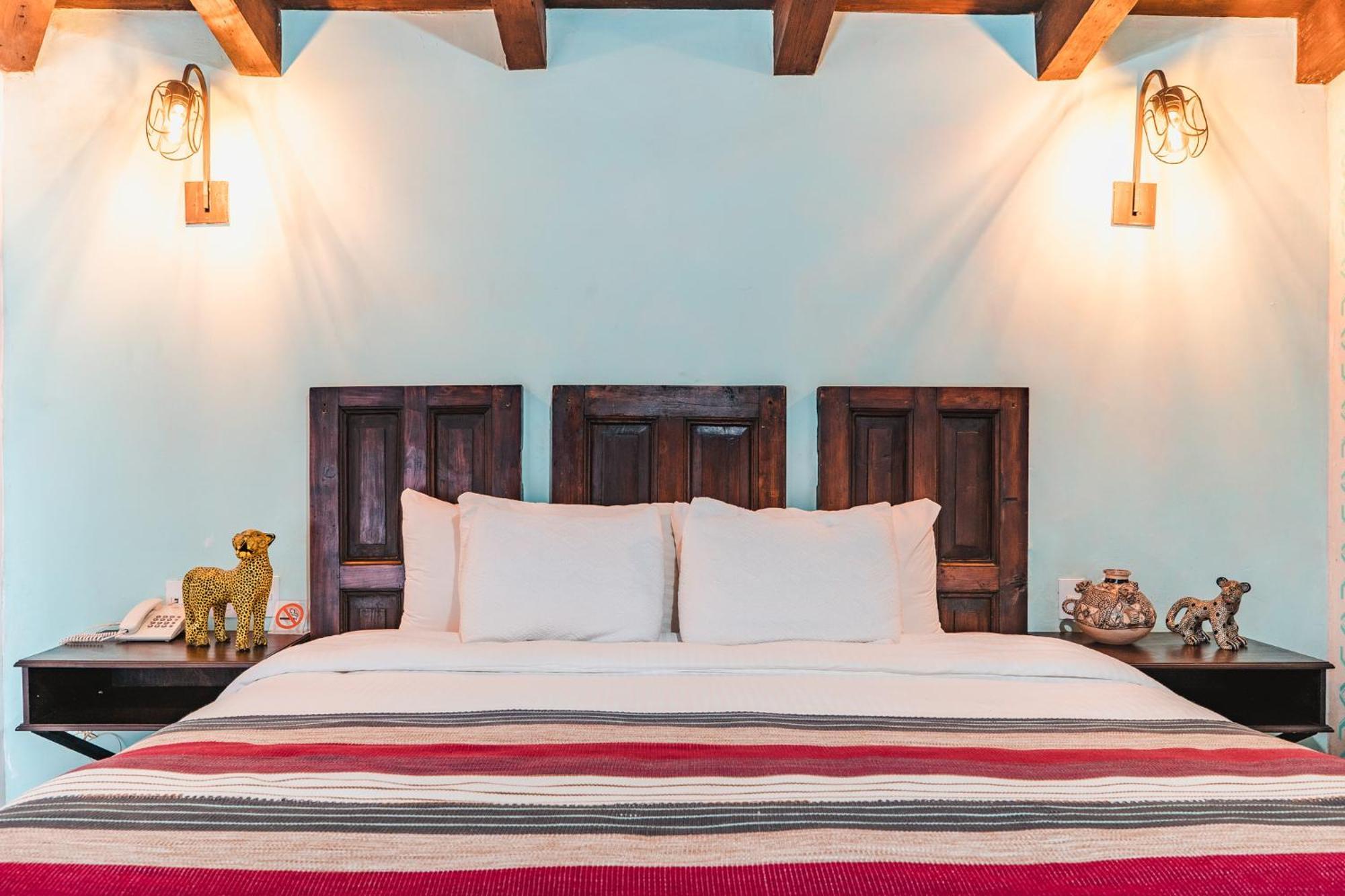 Yox Hotel Boutique San Cristobal de las Casas Room photo A bedroom at the hotel